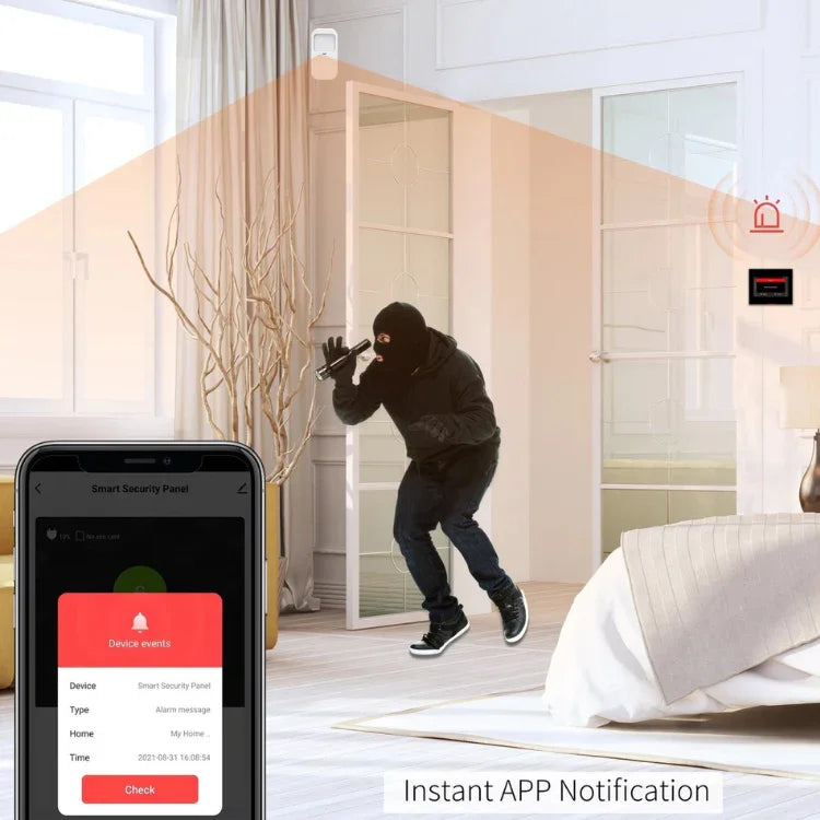 Larmsystem upptäcker inbrottstjuv i hemmet, notis visas på smart mobiltelefon