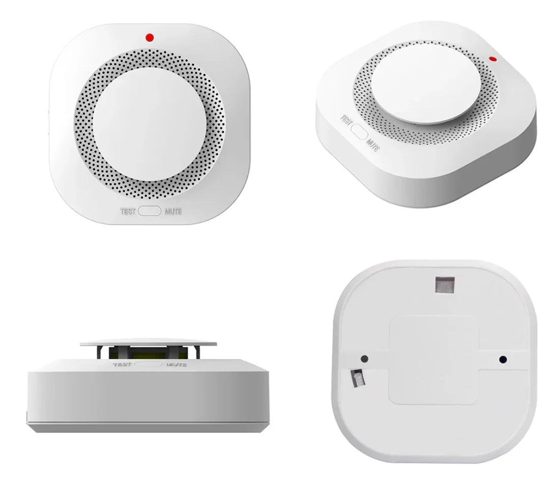 Vit brandvarnare med rund design, test- och muteknapp, visad från fyra vinklar.